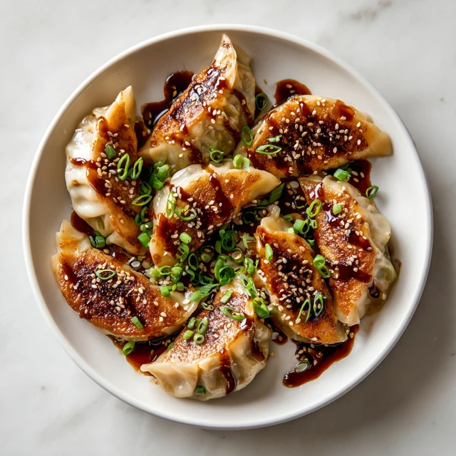 Savory Chinese Dumplings with Rich Meat Filling & Sticky Soy Glaze